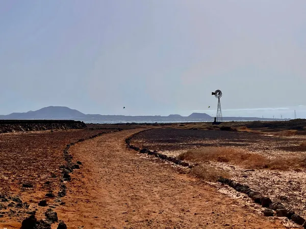 Iron windmill from the Salinas del Marrajo in the Parque Natural Islote de Lobos, in Fuerteventura, Spain.